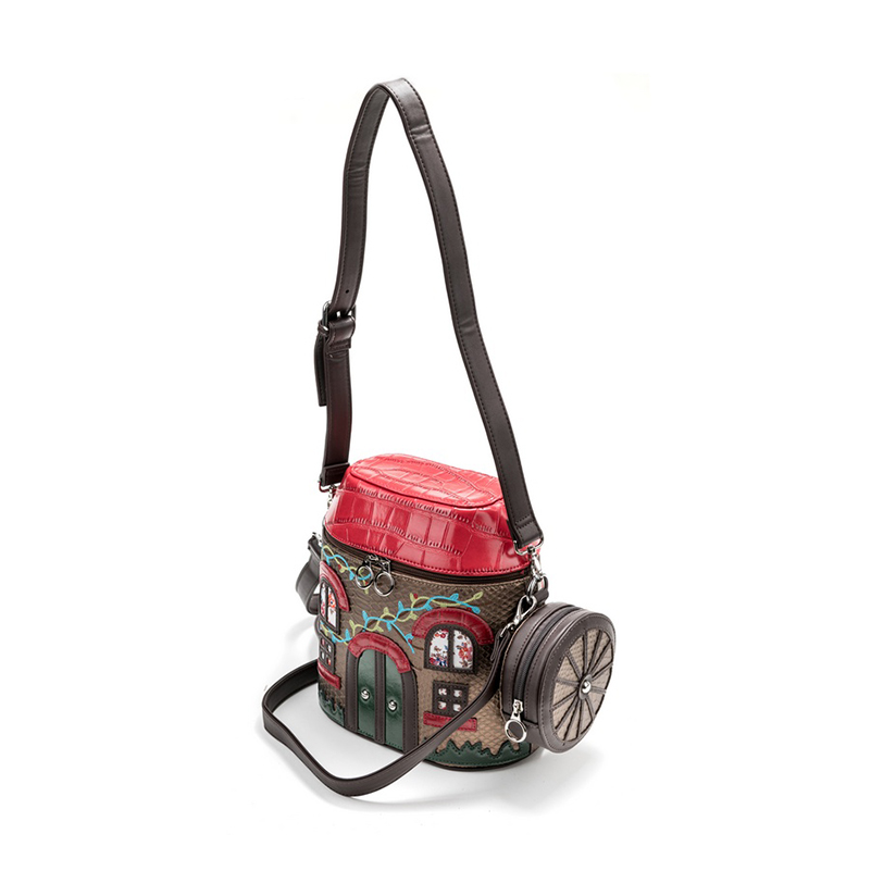 zanimljiva sarena torba od vestacke koze sa raznim detaljima zenske torbe leto 2026