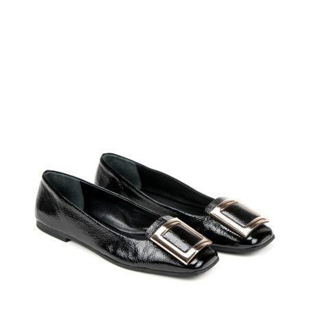 a pair of black flat shoes